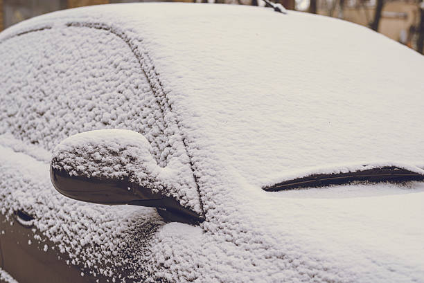 istock car on snow in the morning 627931220
