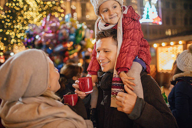 istock Family on Christmas market 627932008