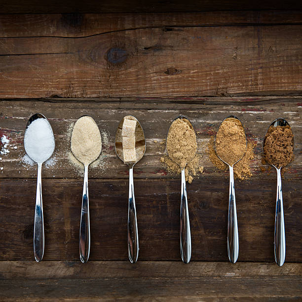 istock Different Kinds of Sugar in the Spoons 627932546