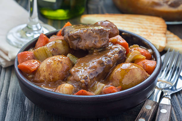 istock Hearty beef stew with carrot, celery, shallot and potato, horizontal 627932590