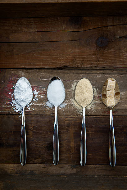 istock Different Kinds of Sugar in the Spoons 627932858