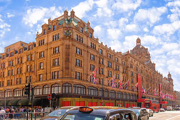 London, UK - May 26, 2012: View of famous department store Harrods. The Harrods motto is Omnia Omnibus Ubique, which is Latin for \