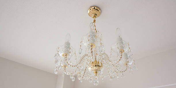 istock Crystal glass glittering chandelier 627941042
