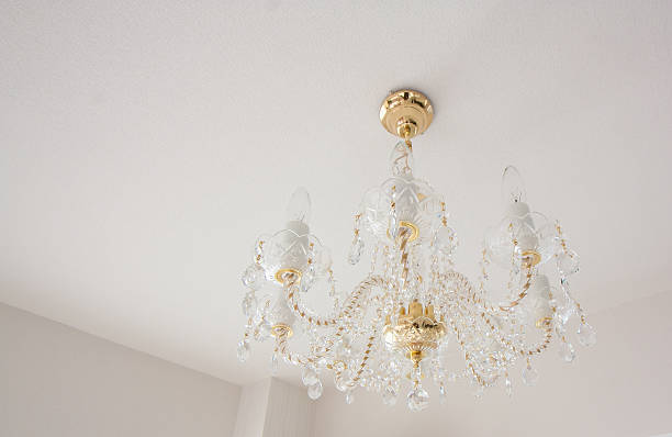 istock Crystal glass glittering chandelier 627941058