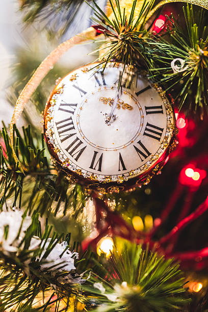 istock Small clock with jewelry as Christmas tree decoration 627943782