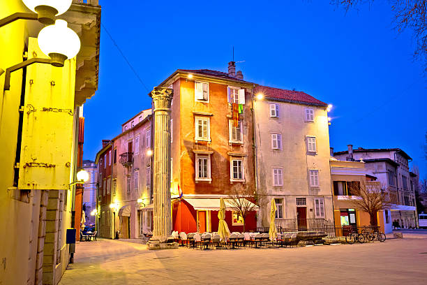 istock Town of Zadar square evening view 627950436