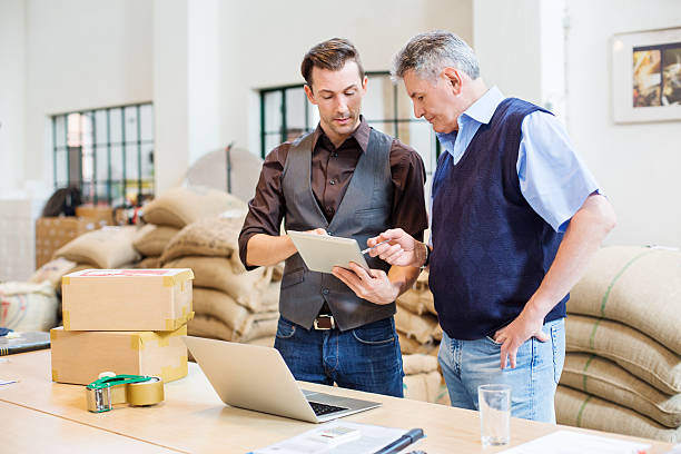istock Two business men at coffee storage room 627956806