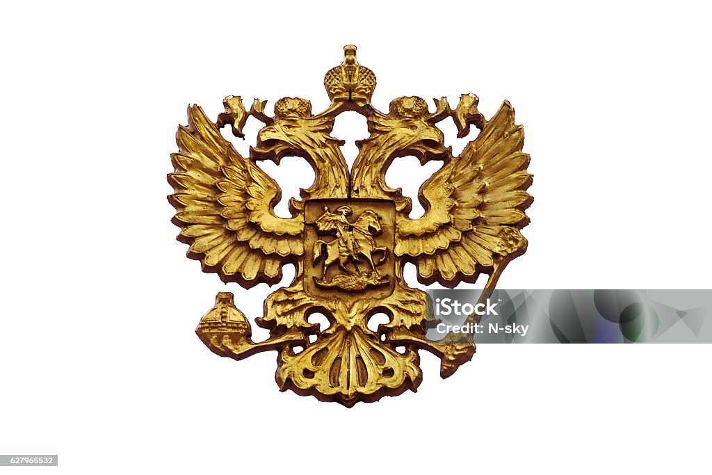 Coat of arms of Russia Cast bronze Russian coat of arms isolated on a white background. Russian State Emblem - a double headed eagle. Animal Body Part Stock Photo