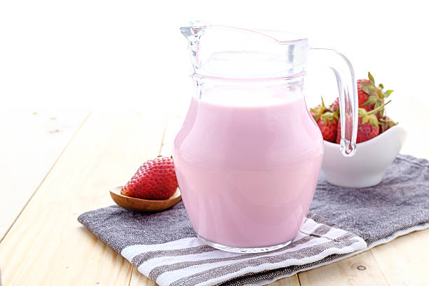 istock Fresh made Strawberry Milk on an old wooden table 627966342