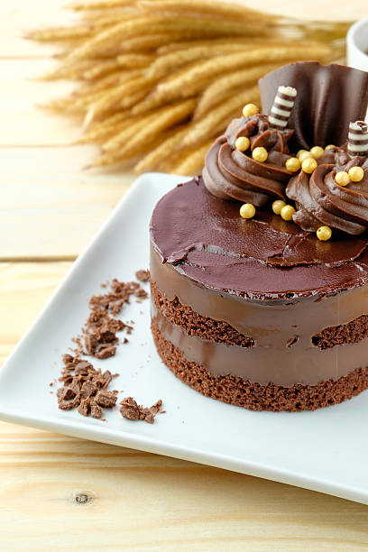 istock chocolate cake on wooden background 627966462