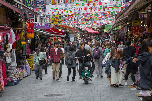Hong Kong - March 14, 2024 : People at the Temple Street Market in Hong Kong.