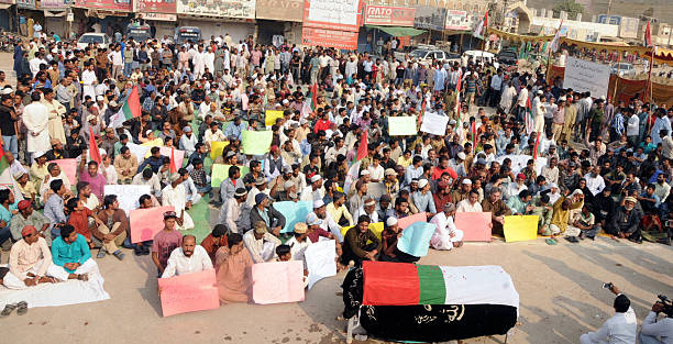 Activists of MQM protest against killing of fellow worker stock photo