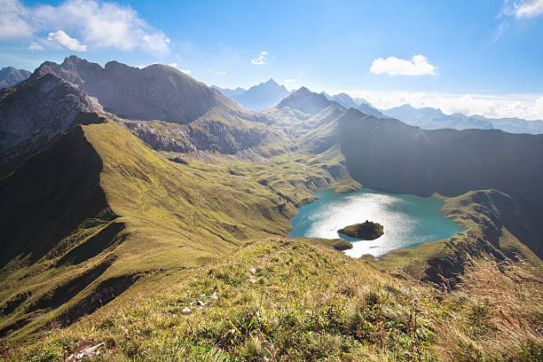 istock mountain peak around Schrecksee lake 627977874