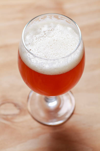 istock Glass of beer on wood 627983046