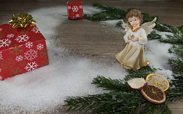 istock Angel, snow, red packet, fir green 627984862