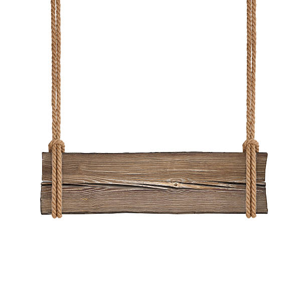 istock Wide wooden signboard hanging on double ropes isolated on white 627984900