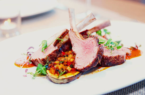 istock Grilled rack of lamb with vegetables, toned 627986600