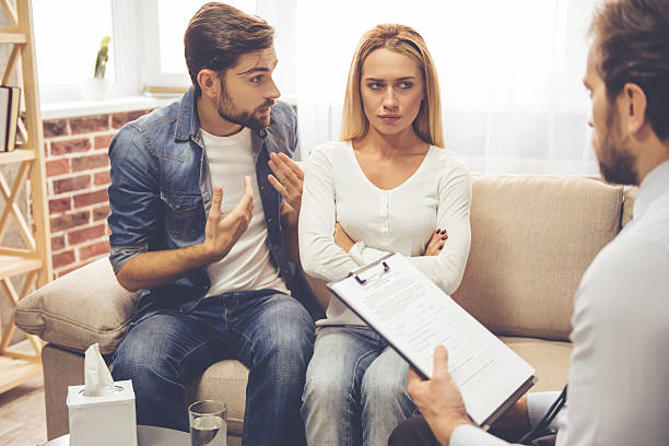 istock Couple at the psychologist 627986972