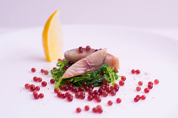 Cold appetizer. Root caviar is the molecular cuisine product.