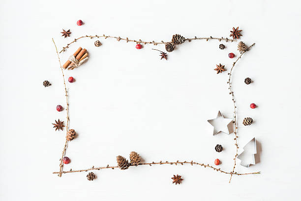 istock Larch branches, cinnamon sticks, anise star, dried cranberry. Christmas frame 627993992
