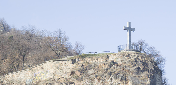 The cross of Jesus over the hill