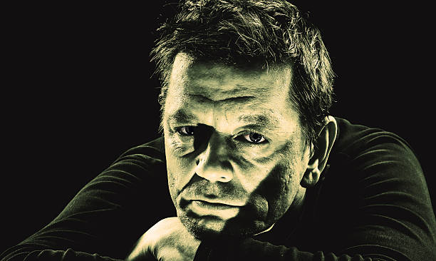 istock Closeup of a pensive man 627997678