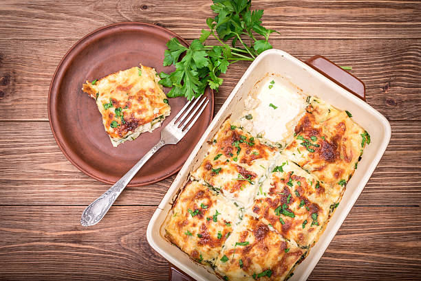 Chicken lasagna and white cheese . stock photo