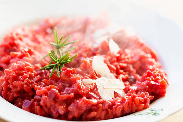istock close up steaming hot red beet risotto on a plate 628003826