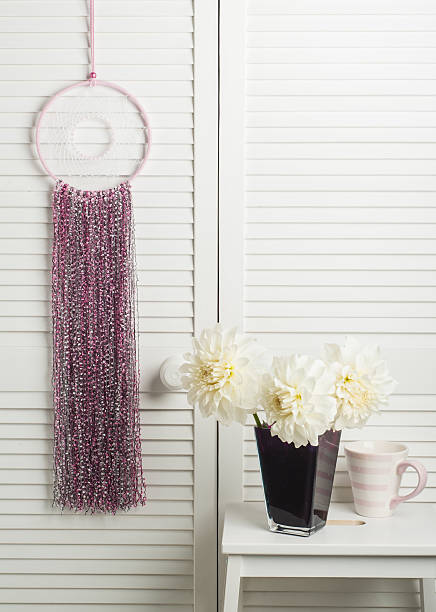 istock Pink dream catcher with flowers 628004370