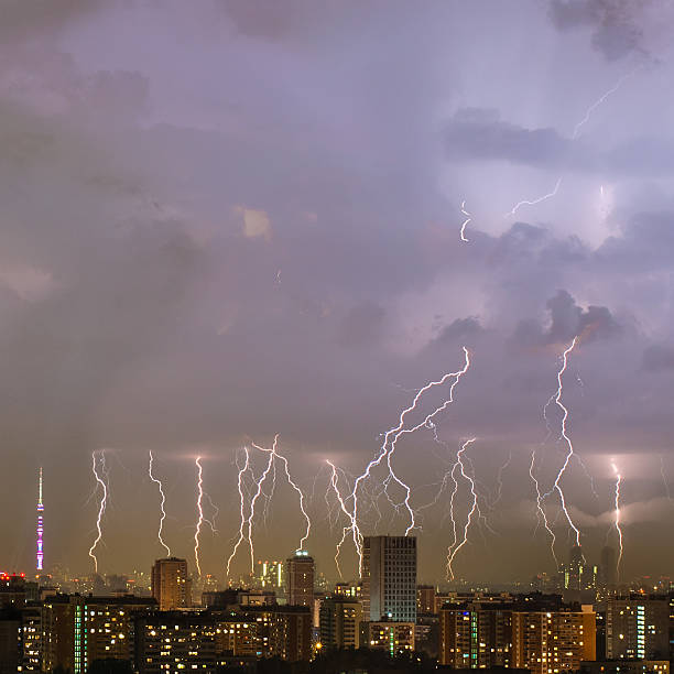 Beautiful lightning strike over big city. Beautiful lightning strike over big city. Moscow, Russia storm cloud sky dramatic sky cloud stock pictures, royalty-free photos & images