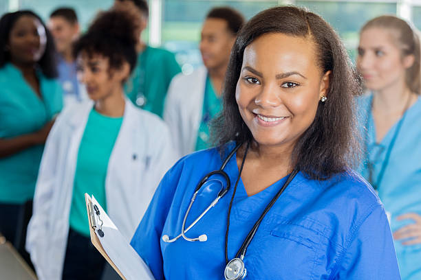 istock Confident African American nursing student in class 628013442