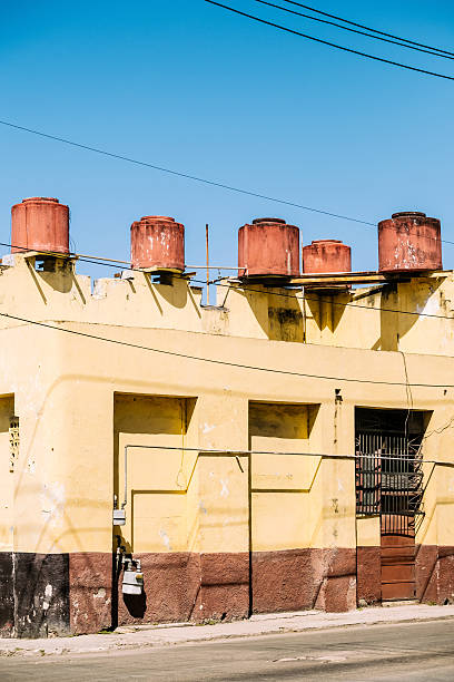 Industrial building with water tanks on the roof  in Old Havana, Cuba.