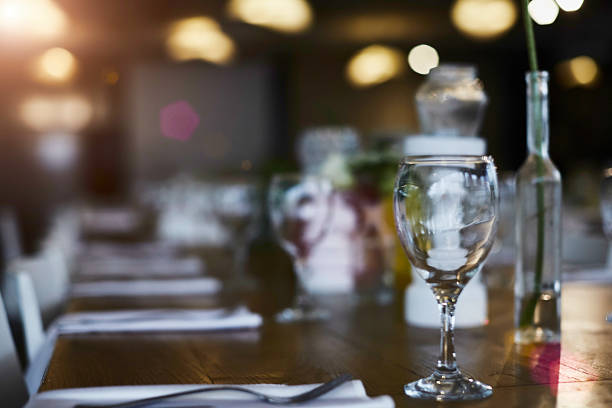 istock glass on the table  top counter Bar restaurant background 628017322