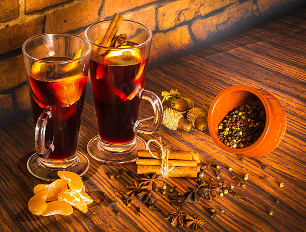 istock Christmas hot mulled wine with cinnamon, cardamom, anise and ora 628023610