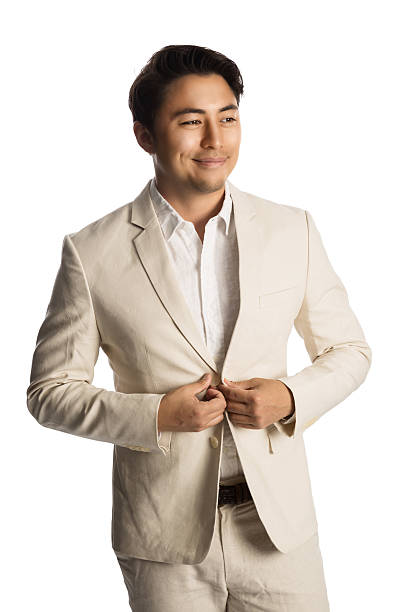 istock Handsome man in bright suit with a smile 628024710