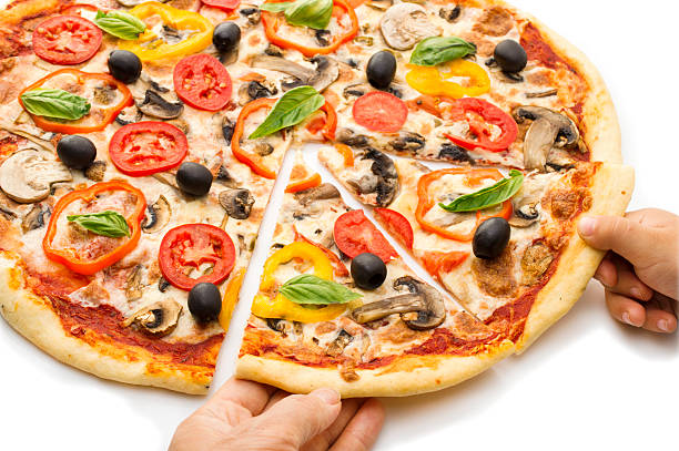 istock Pizza with ham, pepper and olives 628025678