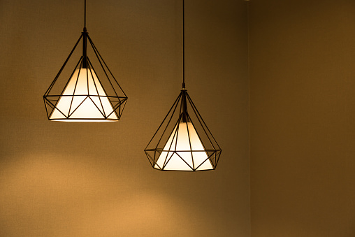 Two pendant lamps hanging on ceiling. Contemporary Design.