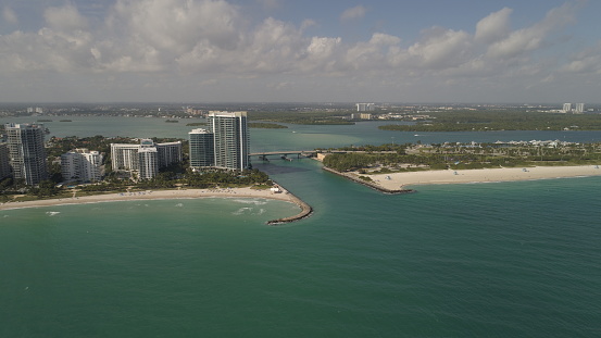Aerial view of Lido Key near Sarasota, Florida with lagoon, mangroves, condos and beach.