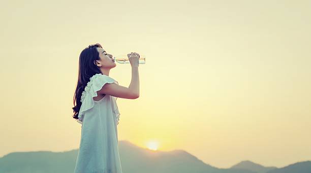 istock Woman drink water for thirst 628031524