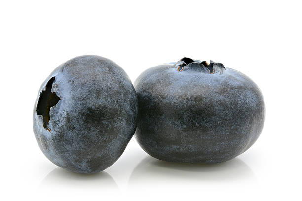 istock Close-up of fresh blueberry on white 628032078