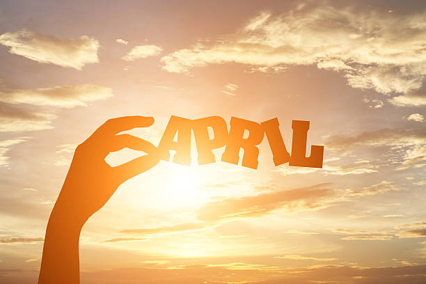 istock Silhouette of hand holding paper cut text 