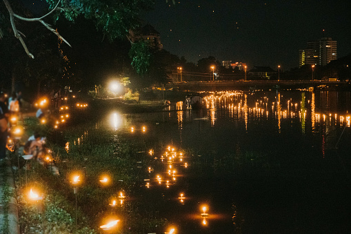 People releasing floating  lanterns in Yee Peng Festival in Chiang Mai 