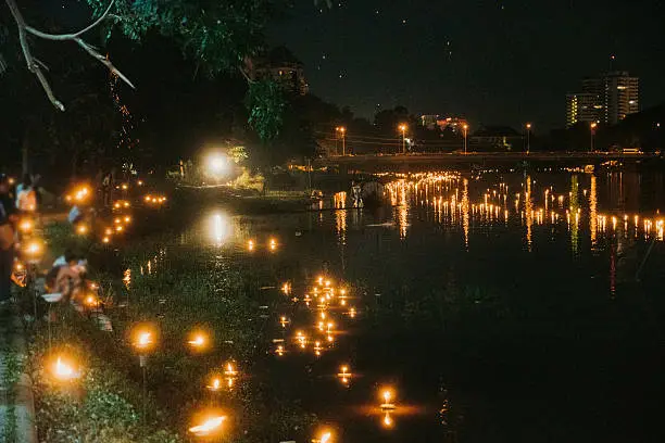 People releasing floating  lanterns in Yee Peng Festival in Chiang Mai 