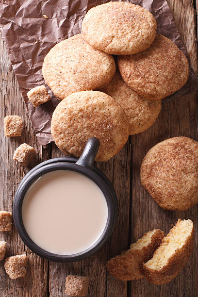 istock cookies Snickerdoodle and coffee with milk close-up. Vertical 628035760