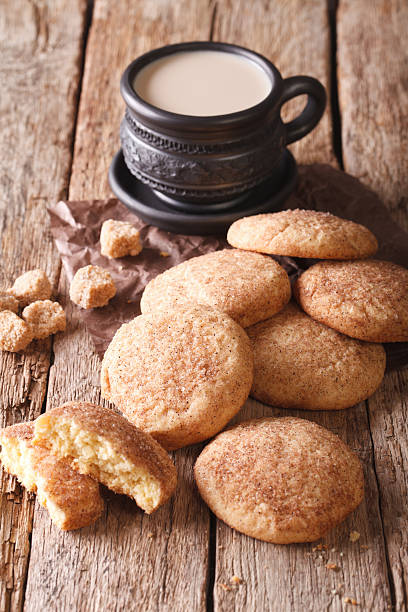 istock Homemade Snickerdoodle cookies and coffee with milk. vertical 628035878