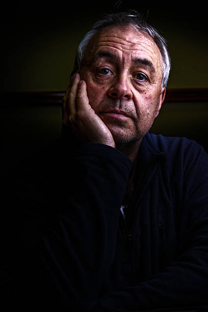 istock Mature man gritty portrait close-up 628036316