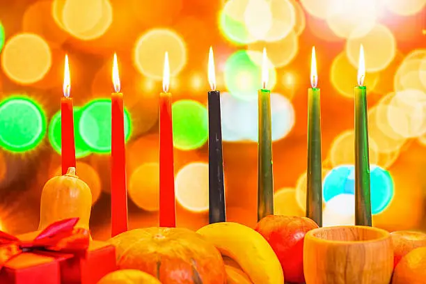 Photo of african Kwanzaa festive concept with decorate seven candles red,