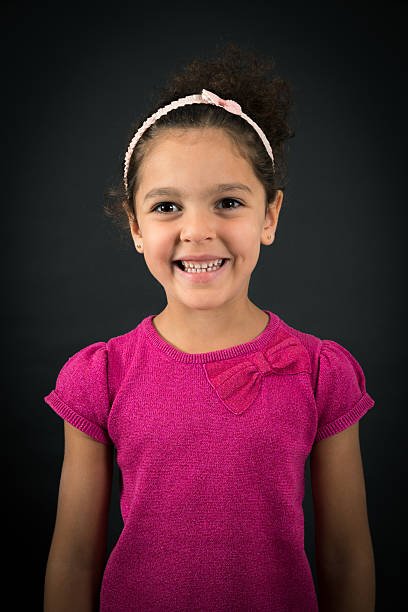 istock Beautiful girl doing different expressions in different sets of clothes: love 628064448
