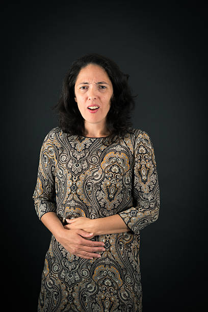 istock Beautiful woman doing different expressions in different sets of clothes: hungry 628066442