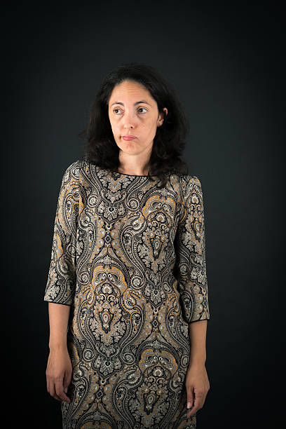 Happy woman portrait. She is dancing and turn around herself.